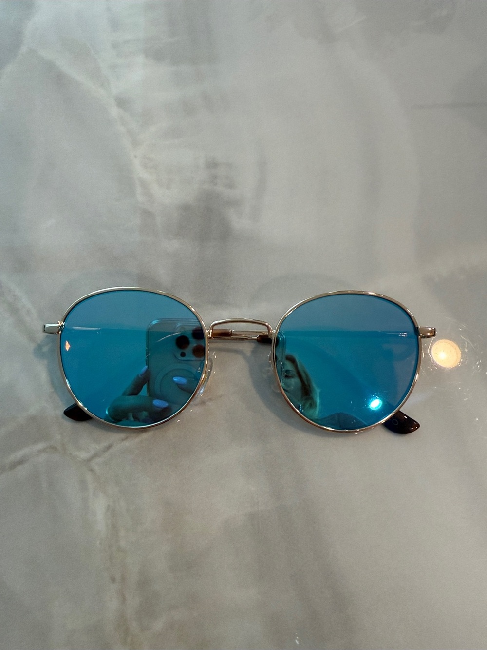 Blue round sunglasses